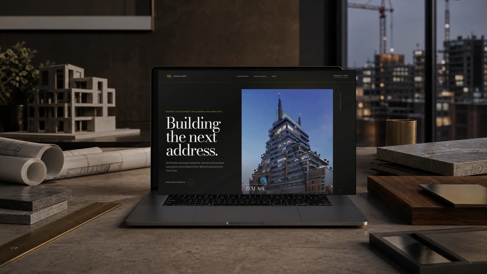 ZEM Builders website shown on a laptop mockup
